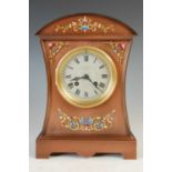 A late 19th century French mantle clock with champleve enamel details,