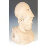 A plaster bust of Pericles wearing a helmet pushed back on his head,