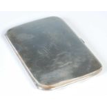 A George V silver cigarette case, Birmingham, 1915, makers mark of H.W.LD,