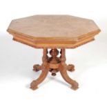 A late 19th century oak octagonal centre table,