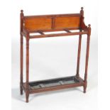 A late 19th century mahogany stick stand,