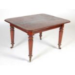 A 19th century mahogany dining table,