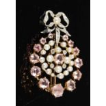 An early 20th century white and yellow metal. pearl, pink tourmaline and diamond brooch,