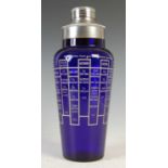 A white metal mounted Art Deco cobalt blue glass cocktail shaker,