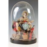 A late 19th century 'Pedlar' doll mounted in a glass dome,