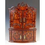 An 18th century Dutch miniature mahogany and marquetry hanging corner cabinet,