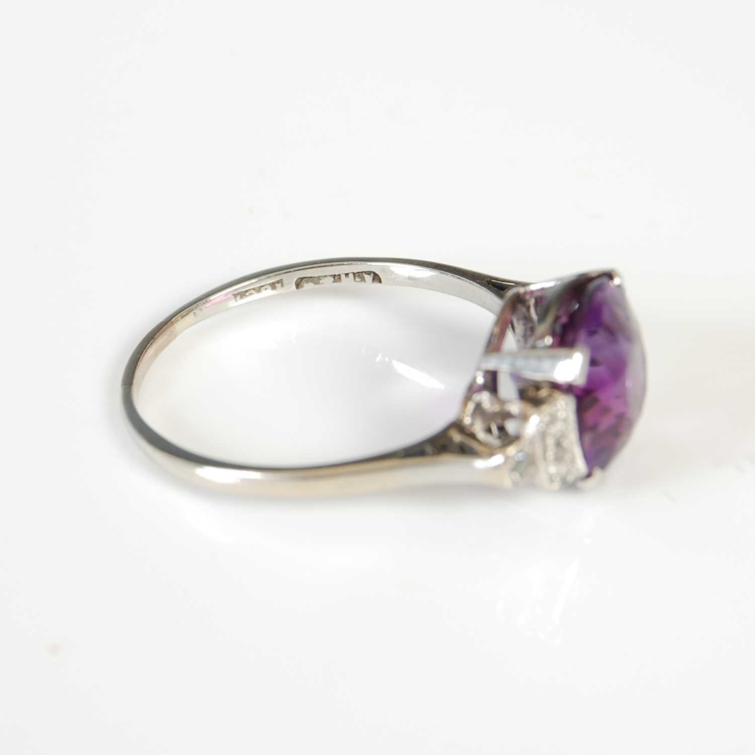 A mid 20th century Art Deco style white metal, amethyst and diamond set cocktail ring, - Image 2 of 6