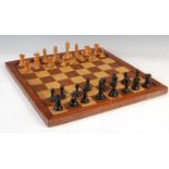 A late 19th century boxwood and macassar ebony weighted chess set,