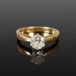 An 18ct yellow and white gold solitaire diamond ring,