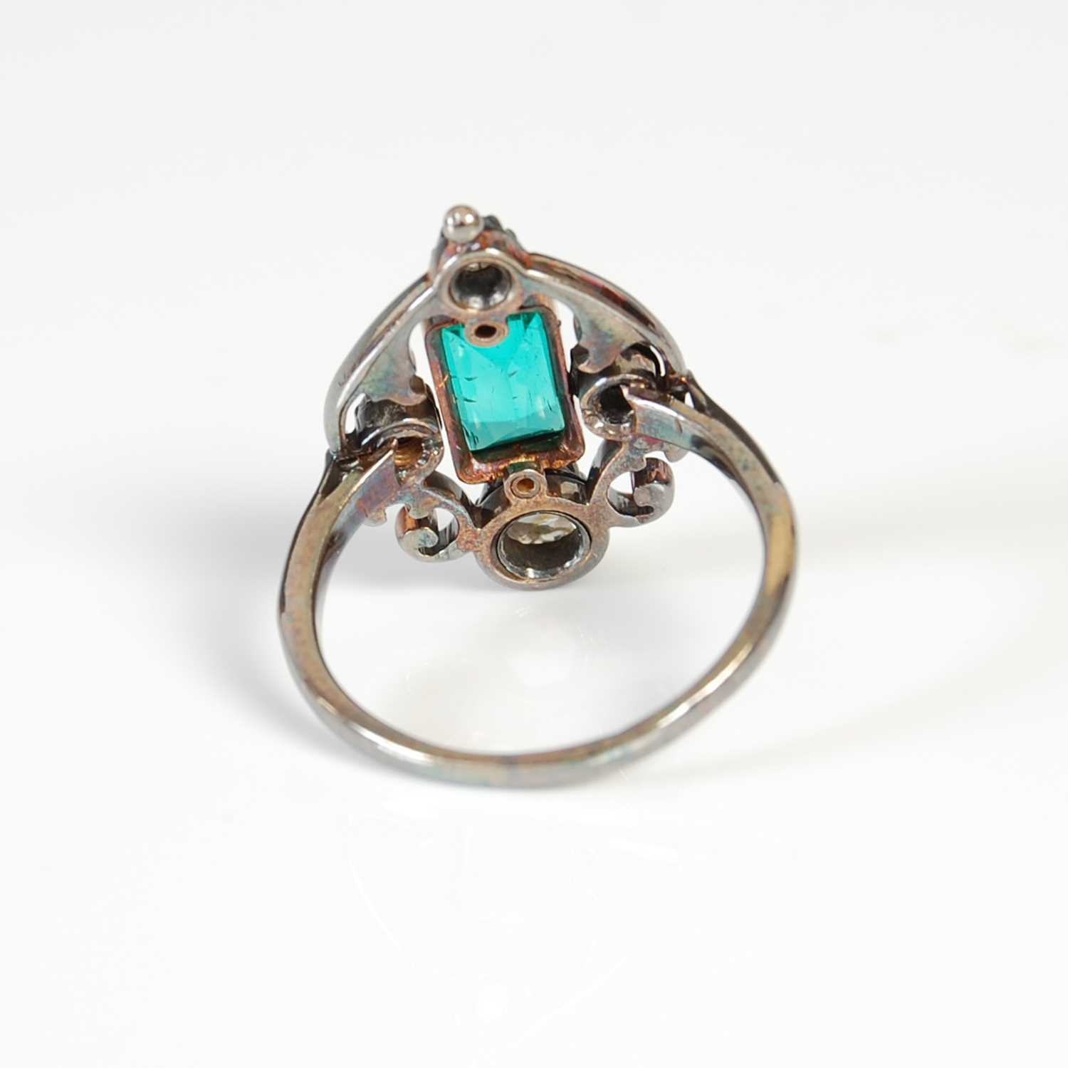 An early 20th century white and yellow metal emerald and diamond set cocktail ring, - Image 9 of 9
