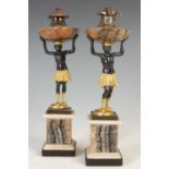 A pair of 19th century Blue John and gilt bronze Blackamoor urns,
