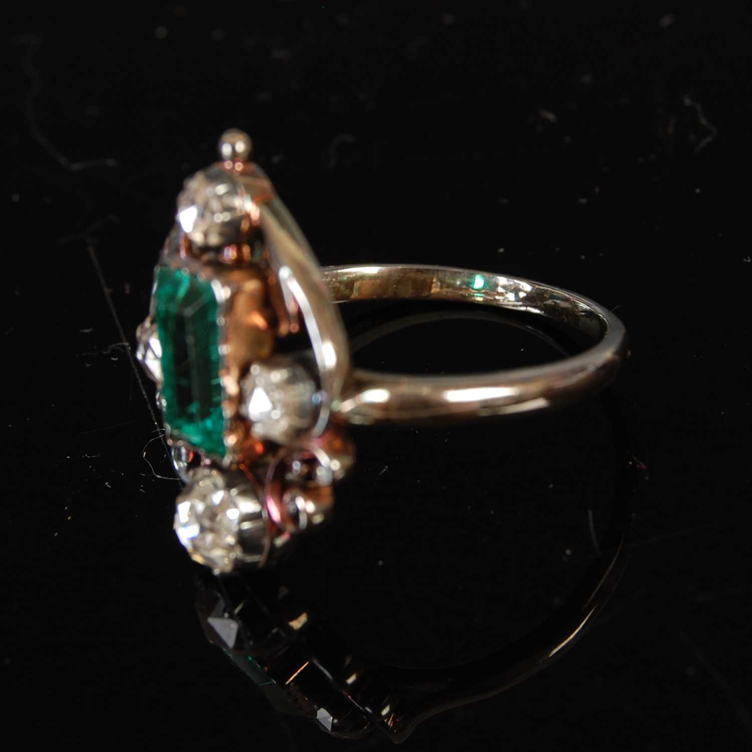 An early 20th century white and yellow metal emerald and diamond set cocktail ring, - Image 6 of 9