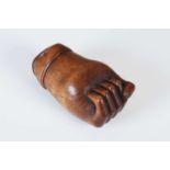 A rare treen snuff box formed as a hand,