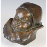 Attributed to Jean Carries (French, 1855-1894), a bronze head of a baby with collar,