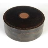 A George III yellow metal inlaid tortoiseshell circular shaped box and cover,