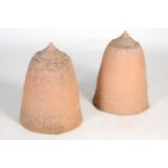 A pair of terracotta rhubarb forcers and covers,