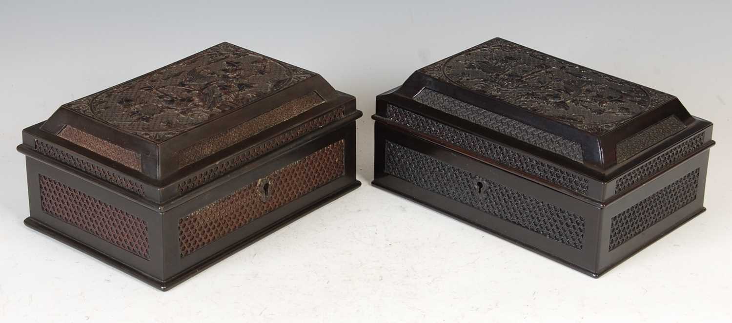 A pair of Chinese lacquered sarcophagus-shaped tea caddies, late 19th/ early 20th century,