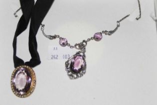 Late 19th/ early 20th century yellow metal mounted split pearl pendant set with facet cut amethyst-