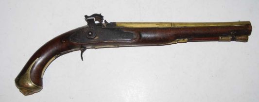 A late 18th / early 19th century walnut and brass percussion pistol, the barrell with touch-marks,