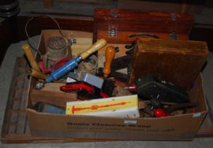A box of assorted vintage tools to include leather working implements, chisels, drill bits and a