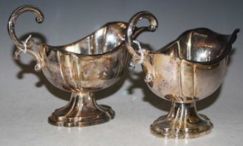 A pair of Edwardian silver sauce boats, Chester 1907, makers mark of 'S.I.LD', 15cm high, 12 troy