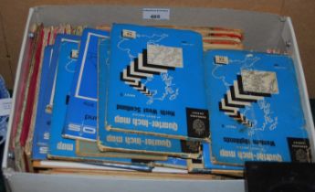 A box of assorted vintage ordnance survey maps.