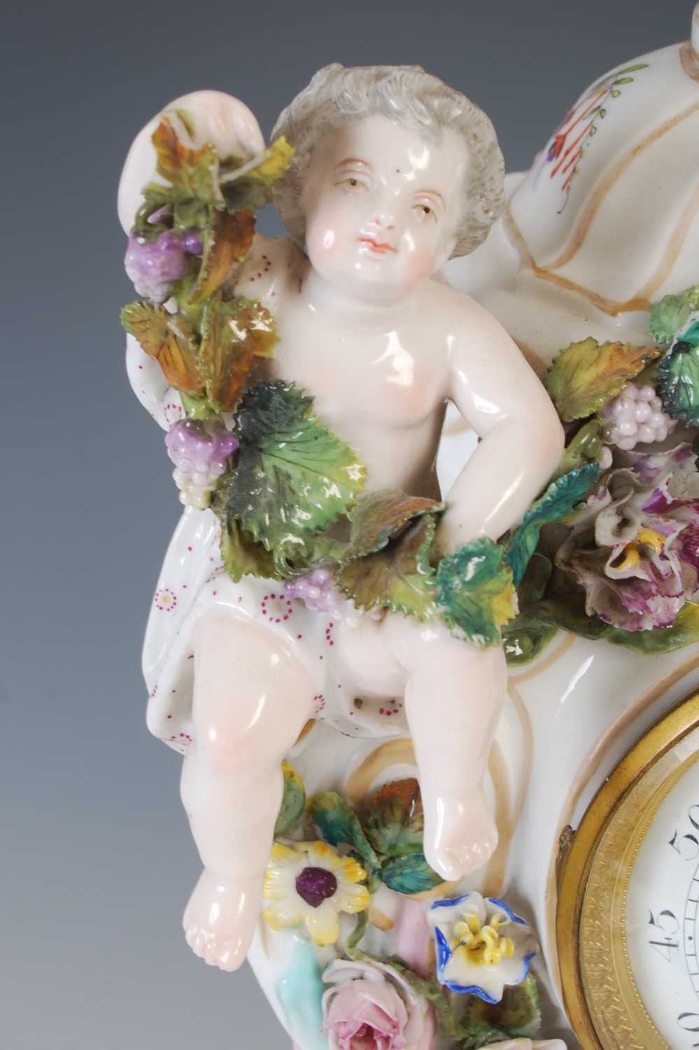 A late 19th / early 20th century Dresden porcelain mantle clock, the circular blue and white - Image 3 of 8