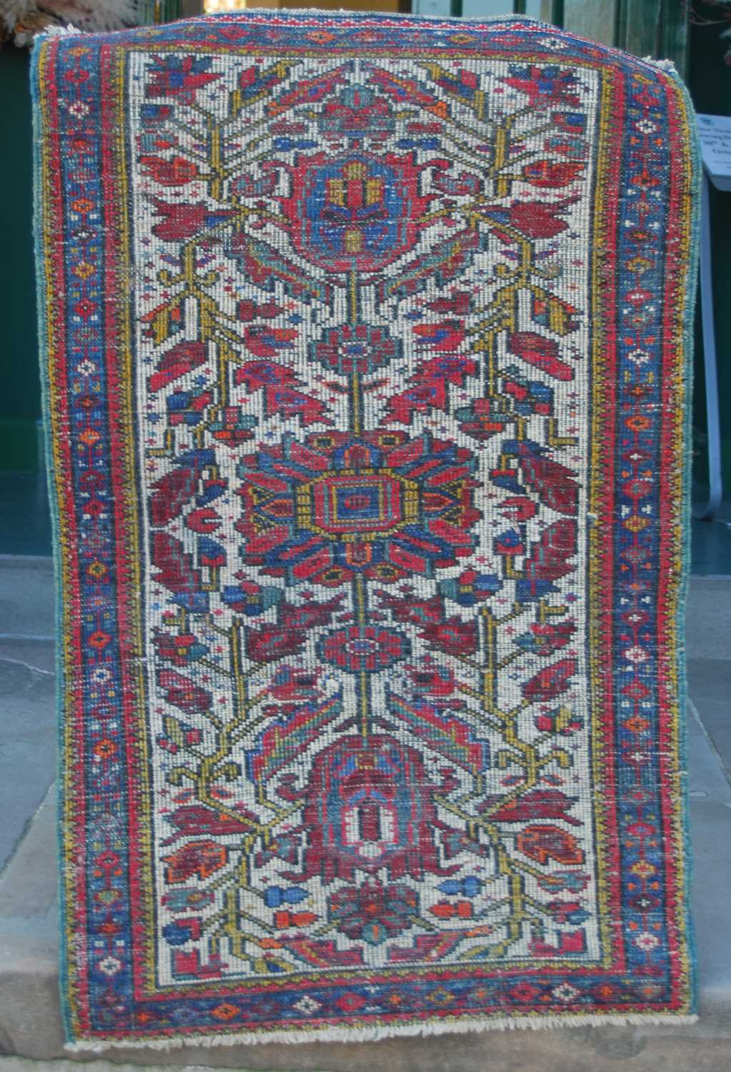 Two small Persian rugs, comprising a brown ground rug decorated with four triangular shaped motifs - Image 2 of 8