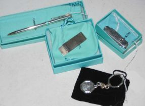 A collection of Tiffany & Co sterling silver ware to include boxed money clip, boxed pocket knife,