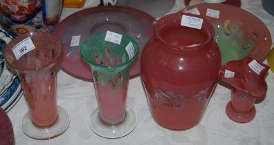 A group of six pieces of Ysart glassware to include an over-sized rim vase in mottled pink and