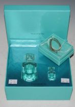 A boxed Tiffany & Co Eau De Parfum two bottle set comprising Natural Spray Vaporisateur and Eau De