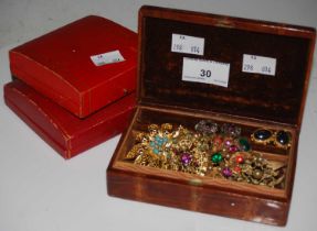 A brown faux crocodile skin leather covered jewellery box containing five assorted costume jewellery