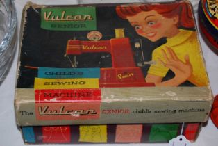 A 'Vulcan Senior' childs sewing machine in original fitted box.