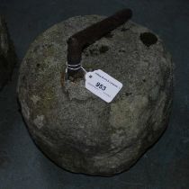 An antique curling stone.