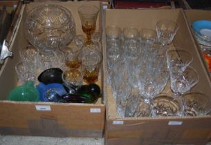 Two boxes of assorted glassware to include a Caithness Fireball pattern paperweight, two art glass