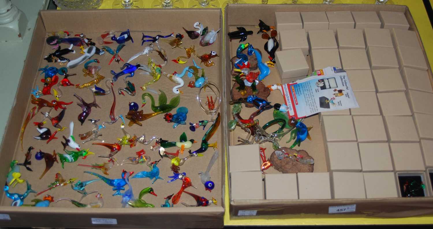 Two boxes of assorted miniature glass animals, some boxed and some unboxed.