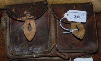 Militaria Interest: two twin-division leather ammunition/ cartridge pouches.