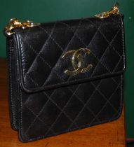 A quilted leather ladies handbag bearing label inscribed 'Chanel, Paris'.