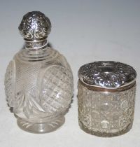 A vintage Birmingham silver mounted cut glass dressing table jar and cover, together with a London