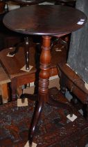 A group of furniture to include an oak drop-leaf table, a mahogany oval top occasional table, an oak