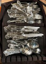 A bag of assorted EP and mixed metal flatware.