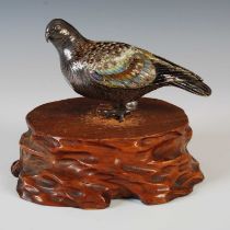 A Japanese white metal and enamel model of a turtle dove, late 19th/ early 20th century, with brown,