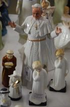 Three Royal Doulton and two Royal Worcester figures comprising Royal Doulton 'His Holiness Pope John