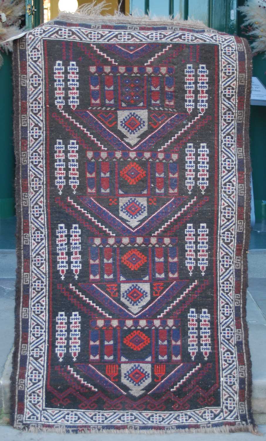 Two small Persian rugs, comprising a brown ground rug decorated with four triangular shaped motifs - Image 6 of 8