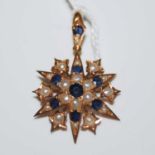 A late 19th century yellow metal, split pearl and sapphire star-shaped pendant, gross weight 4.5