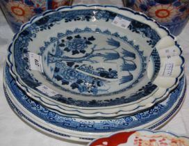 A group of six blue and white ceramic plates, to include three English circular willow pattern