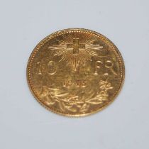 A 1913 ten franc gold coin, 3.4 grams.