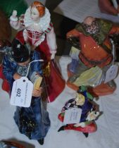 A group of four Royal Doulton figures comprising 'Lady Jester' HN1284, 'The Wizard' HN2877, '