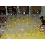 A collection of assorted glassware to include an EP mounted claret jug, decanters, and various