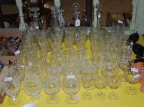 A collection of assorted glassware to include an EP mounted claret jug, decanters, and various